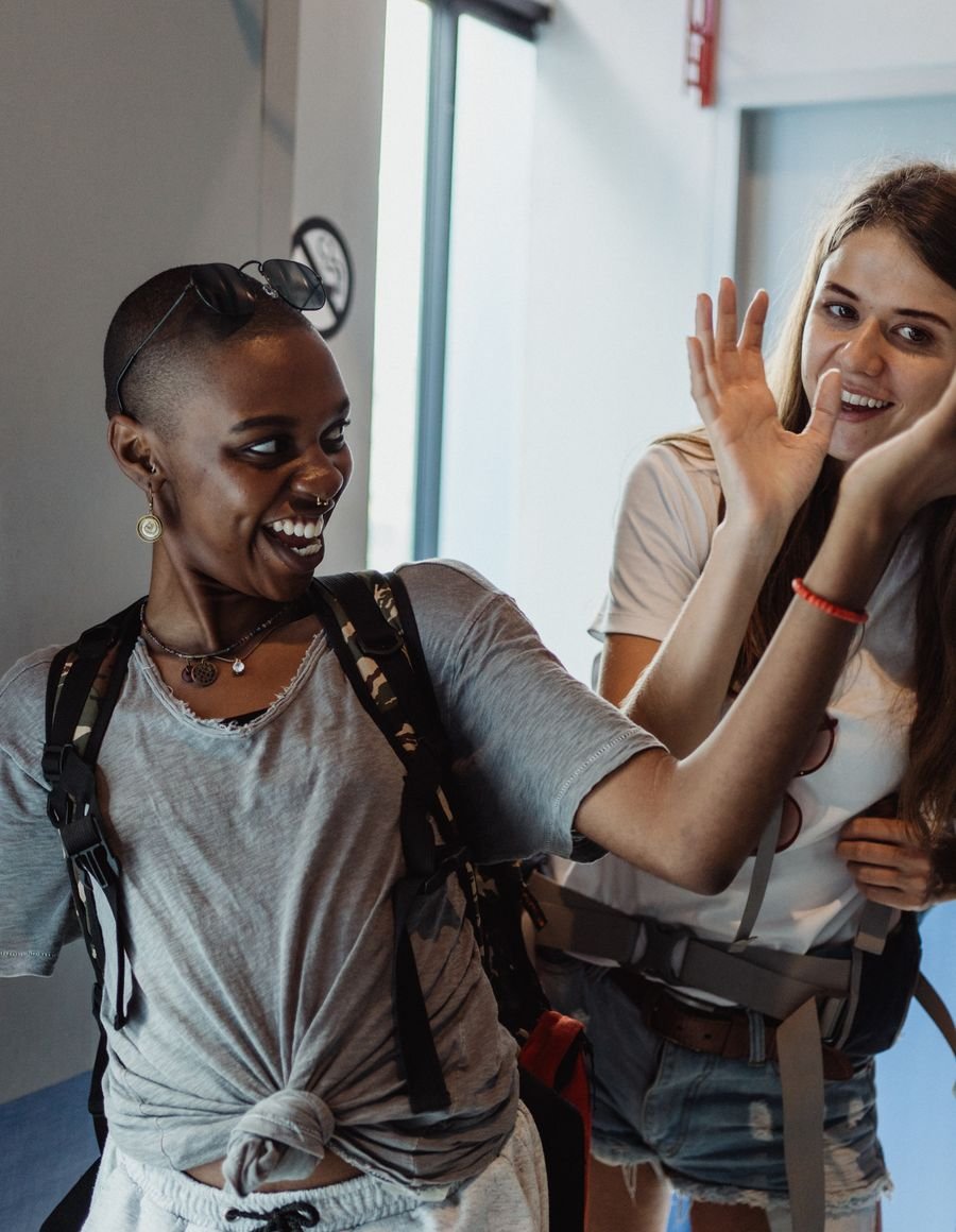 Travelers arriving at a hotel room.